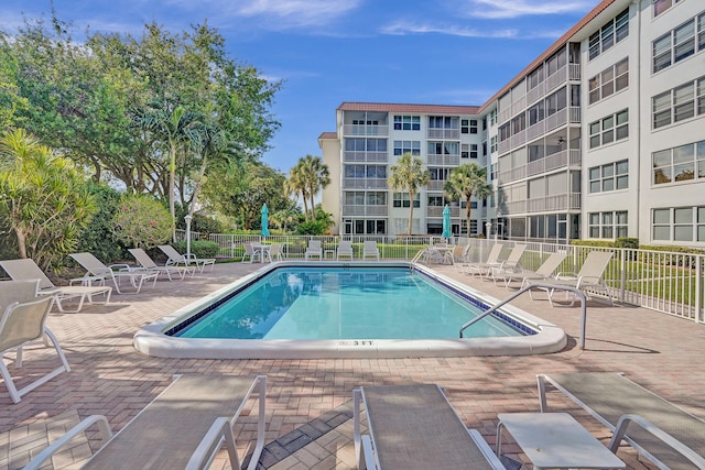 view of swimming pool featuring a patio