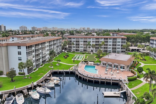 birds eye view of property featuring a water view