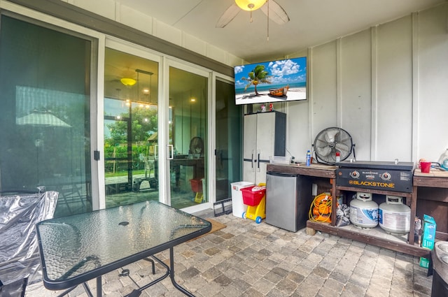 view of patio with ceiling fan