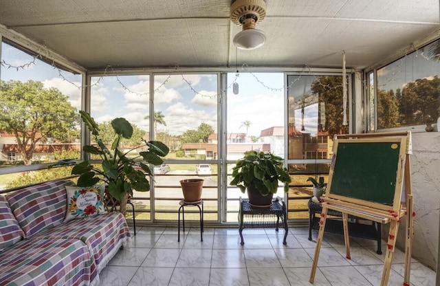 sunroom featuring a wealth of natural light