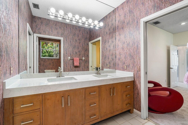 bathroom featuring vanity, wooden walls, toilet, and tile patterned flooring