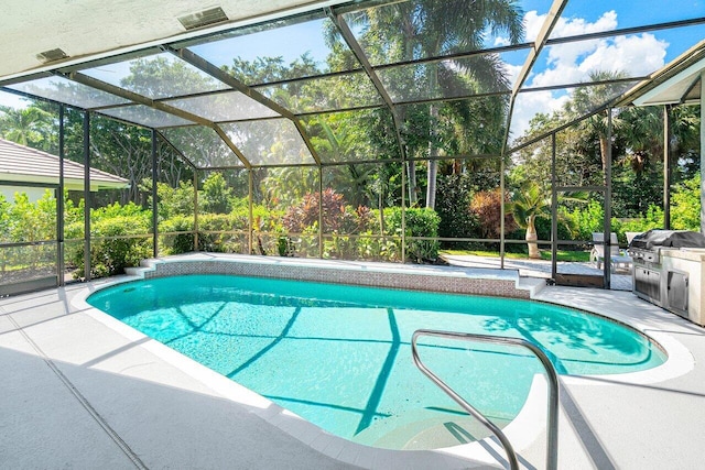 view of swimming pool with a patio area, grilling area, and glass enclosure