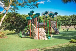 view of jungle gym with a lawn