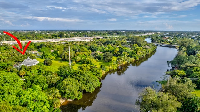 birds eye view of property featuring a water view