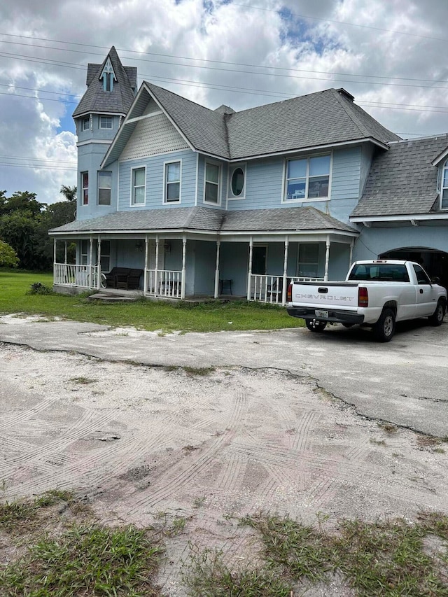 view of front facade with covered porch