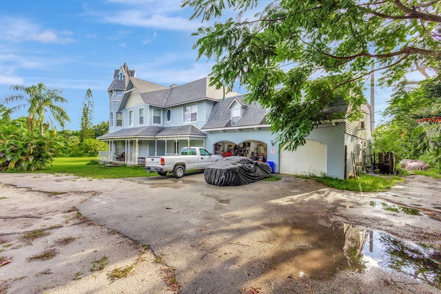 victorian home with a garage