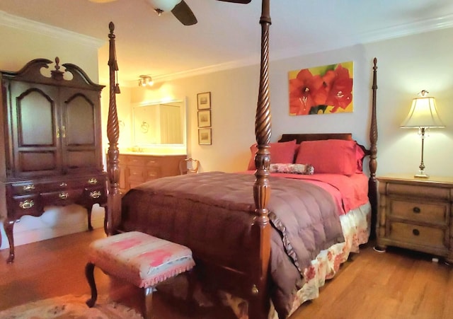 bedroom with ceiling fan, light hardwood / wood-style flooring, and ornamental molding