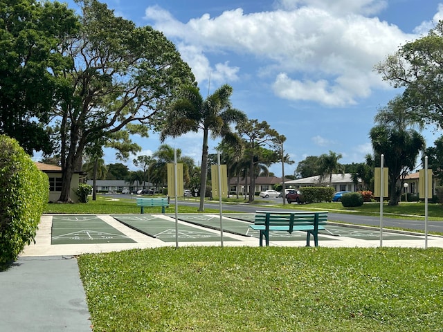 view of community with a yard