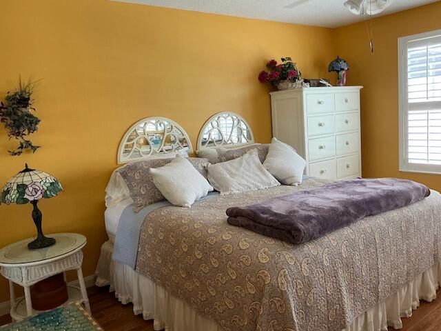 bedroom featuring hardwood / wood-style floors