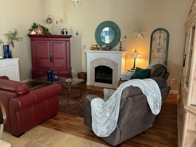 living area with hardwood / wood-style flooring