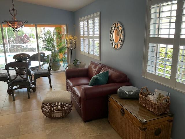 sitting room featuring light tile patterned floors