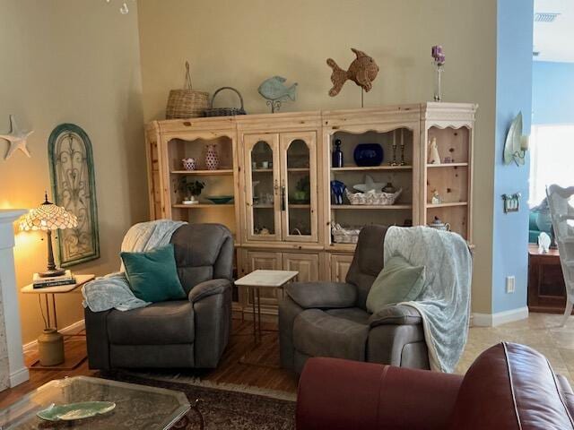 sitting room with light hardwood / wood-style floors