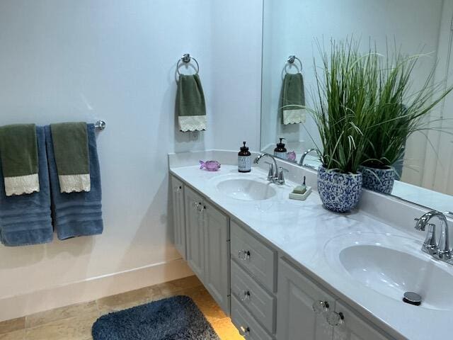 bathroom featuring vanity and tile patterned flooring