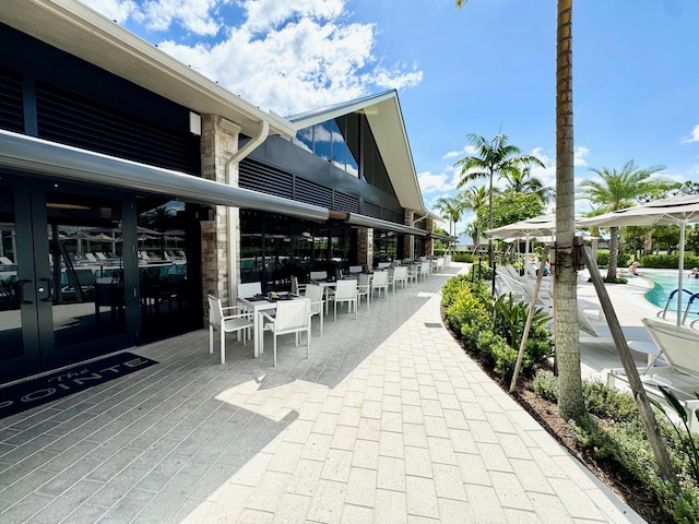 exterior space with a community pool