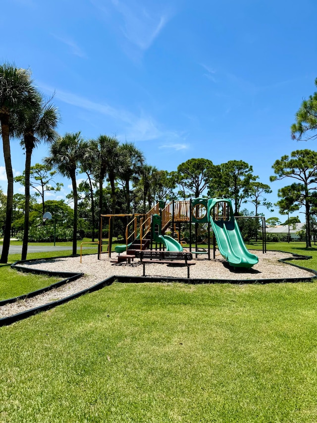 view of play area with a yard