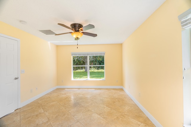 unfurnished room with ceiling fan