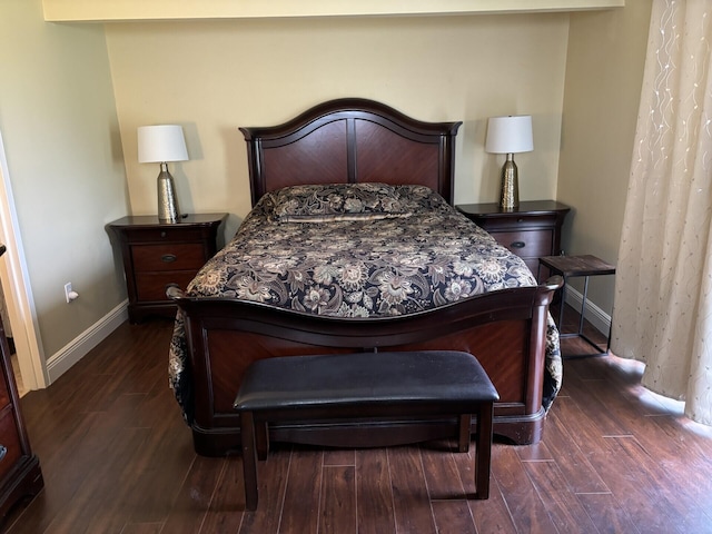 bedroom featuring dark hardwood / wood-style flooring