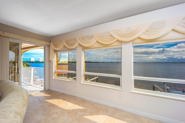 sunroom with a water view