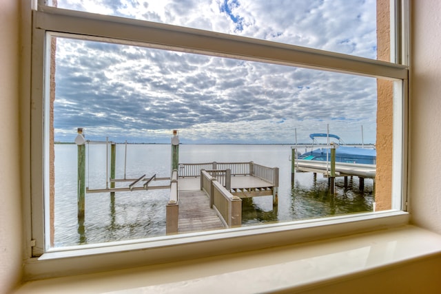 dock area featuring a water view