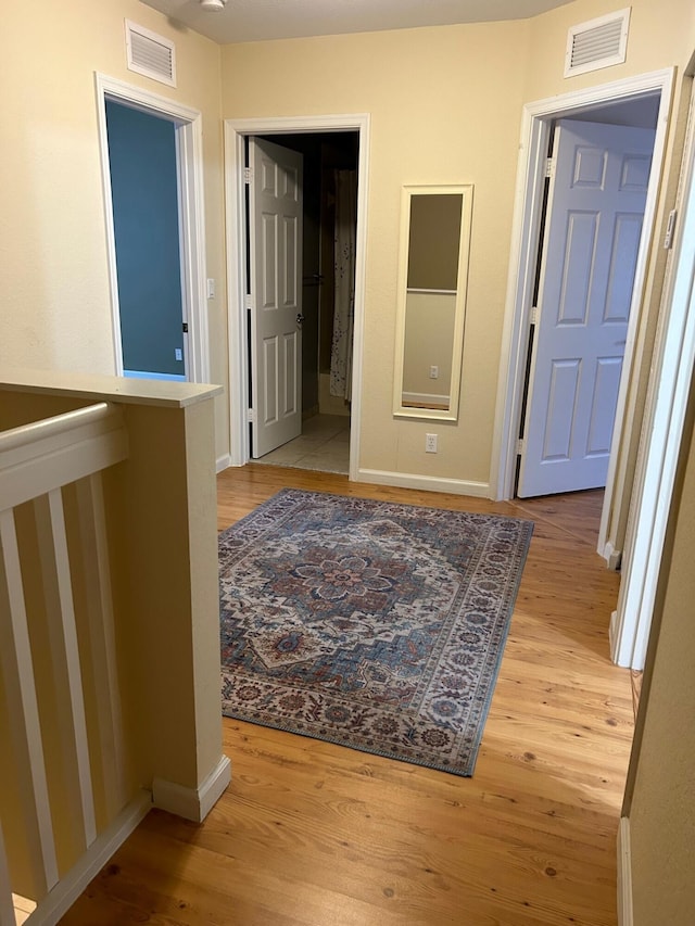 hall featuring light hardwood / wood-style floors