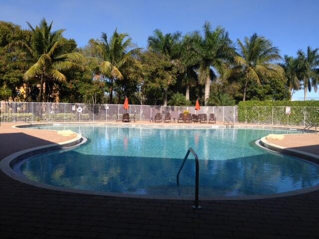 view of swimming pool with a patio area