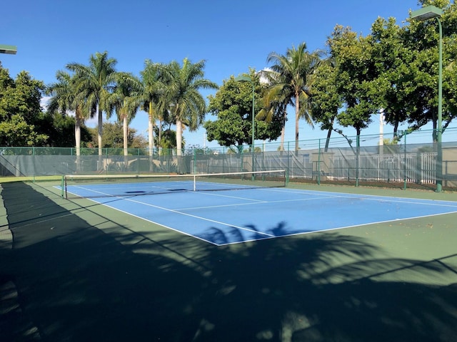 view of tennis court with basketball court