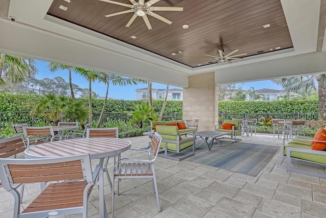 view of patio / terrace with ceiling fan and an outdoor hangout area