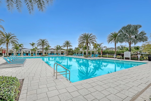 view of swimming pool featuring a patio area