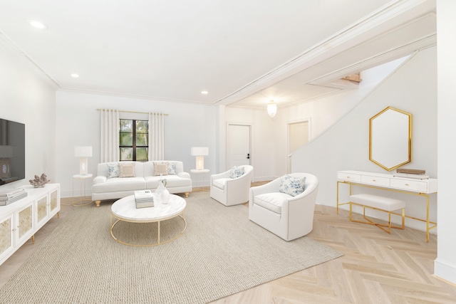 living room featuring crown molding and light parquet floors