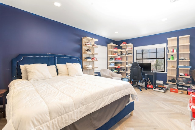 bedroom with parquet flooring