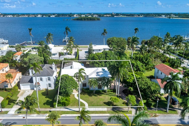 birds eye view of property featuring a water view