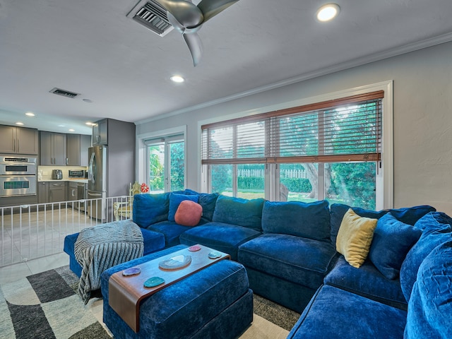 tiled living room featuring ornamental molding