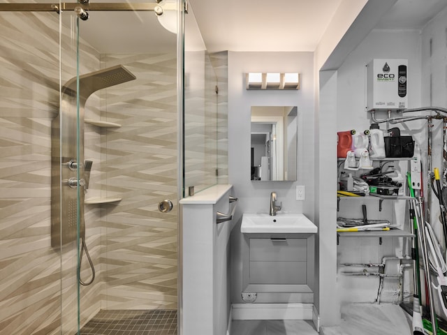 full bathroom featuring a shower stall and vanity