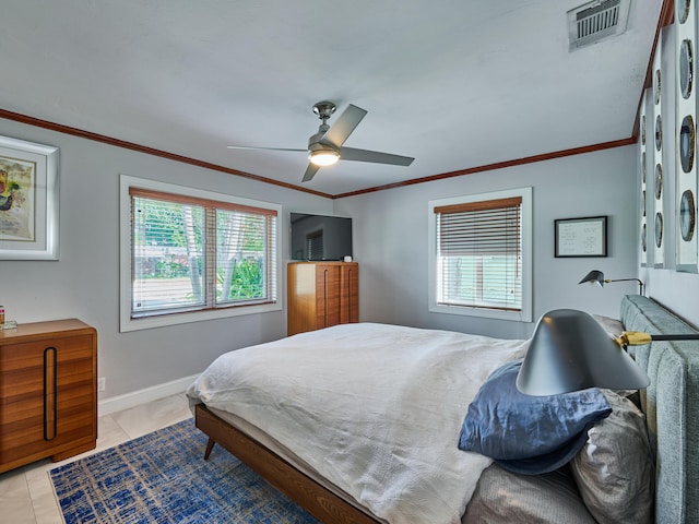 bedroom featuring crown molding, ceiling fan, baseboards, and light tile patterned floors