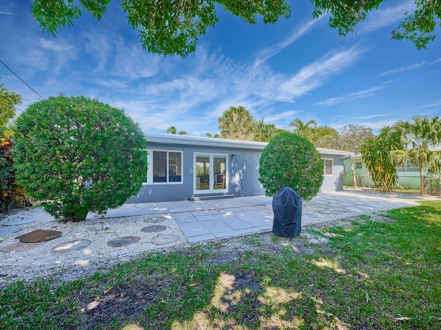 view of front of house featuring a patio