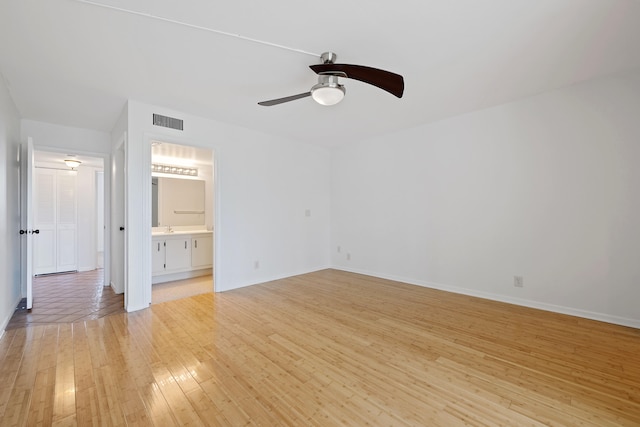 interior space with light hardwood / wood-style flooring and ceiling fan