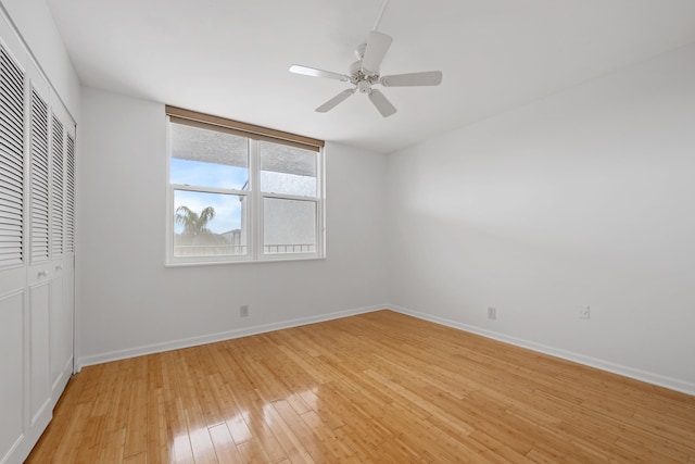 unfurnished bedroom with a closet, ceiling fan, and light hardwood / wood-style flooring