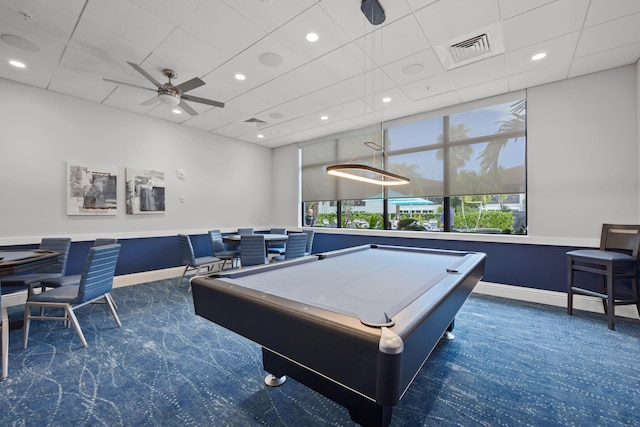 recreation room featuring dark carpet, pool table, a paneled ceiling, and ceiling fan