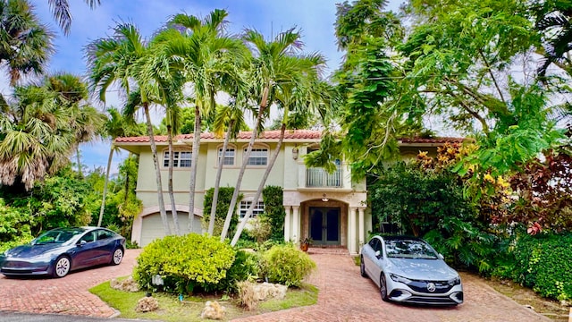 view of front of house featuring french doors and a garage