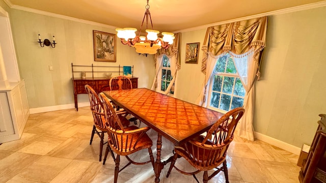 dining room featuring a notable chandelier and crown molding