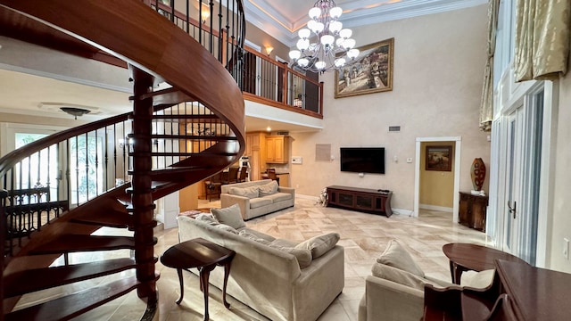 living room featuring a chandelier, a towering ceiling, and crown molding