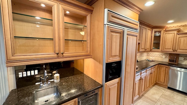 kitchen with dark stone counters, sink, stainless steel dishwasher, paneled fridge, and beverage cooler