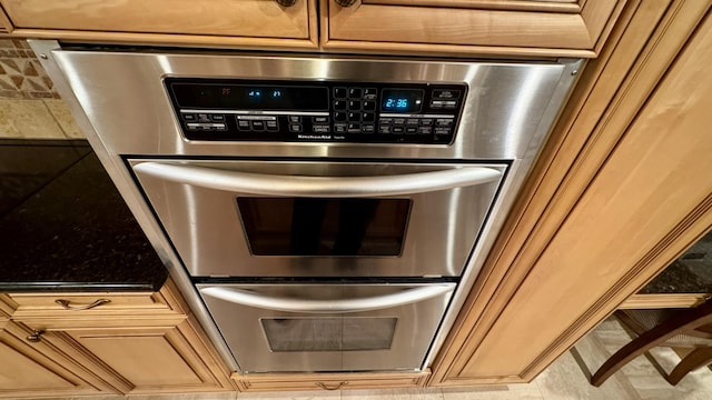 details featuring stainless steel double oven