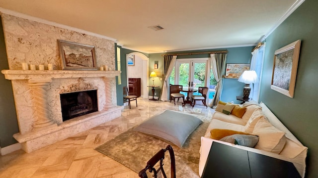 living room with a fireplace and ornamental molding