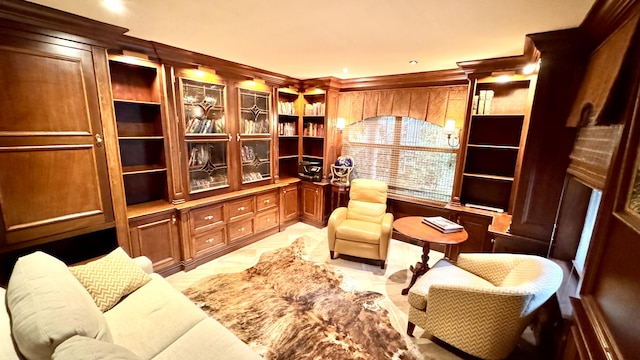 sitting room featuring ornamental molding