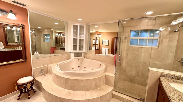 bathroom featuring tile patterned floors, vanity, and independent shower and bath