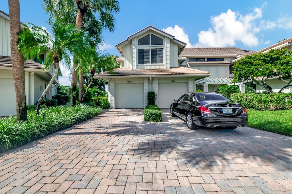 view of front of home with a garage