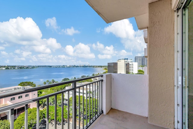 balcony featuring a water view