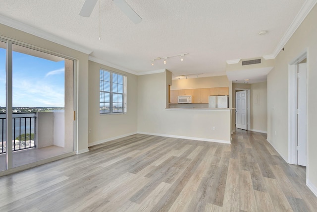 unfurnished living room with light wood-type flooring, crown molding, a textured ceiling, and ceiling fan