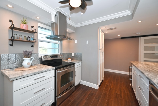 kitchen featuring dark hardwood / wood-style flooring, appliances with stainless steel finishes, white cabinetry, light stone countertops, and island range hood